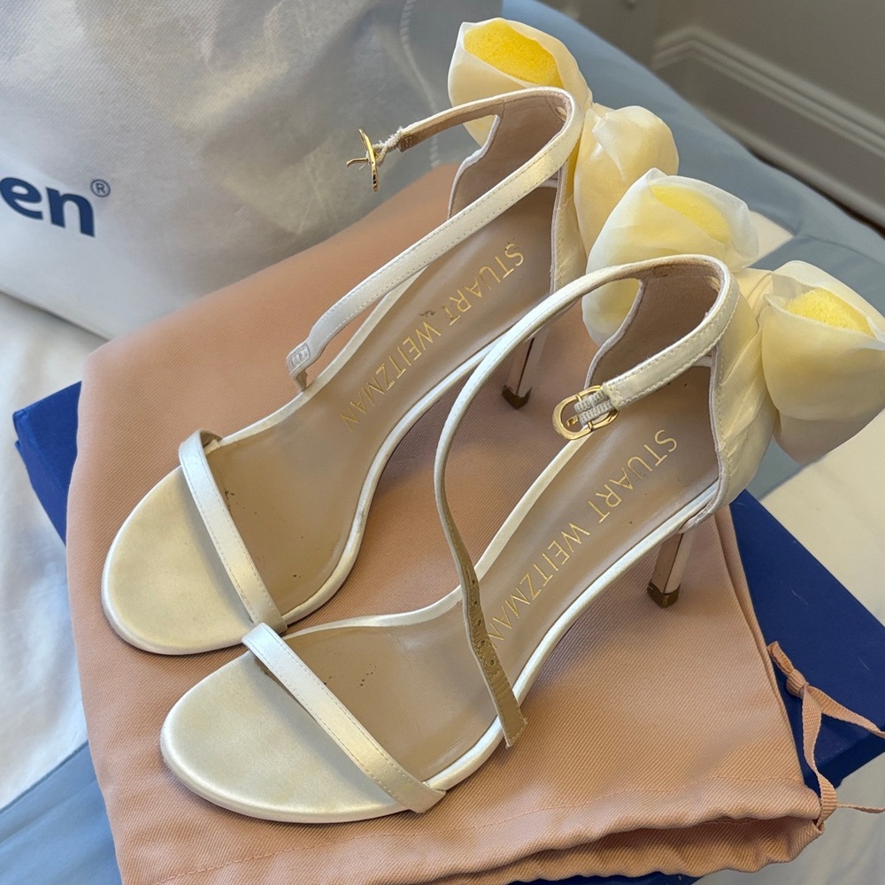 Stuart Weitzman Ivory Satin Ankle-Strap Heels with Floral Accent
